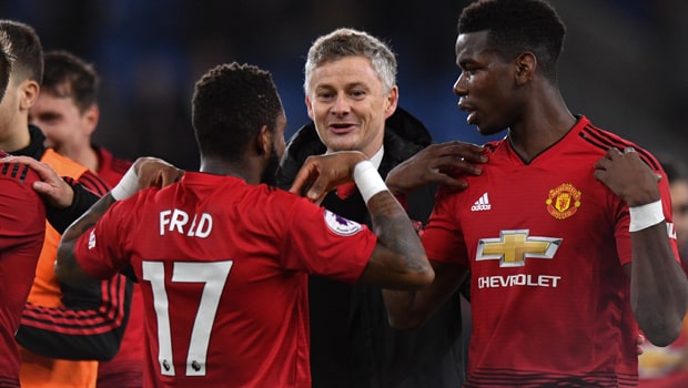 Ole-Gunnar-Solskjaer-and-Paul-Pogba-Man-United-Interim-Manager-min