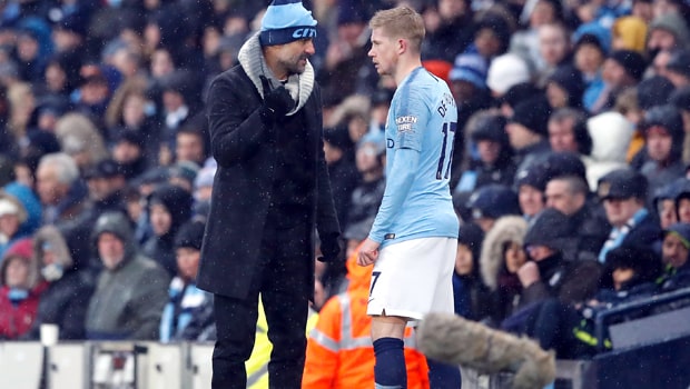 Pep-Guardiola-Kevin-De-Bruyne-Manchester-City-min