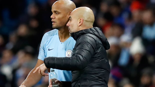 Pep-Guardiola-and-Vincent-Kompany-Man-City-min