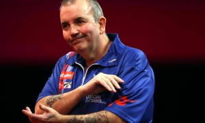 Phil Taylor knock down in darts