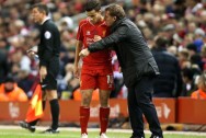Liverpool boss Brendan Rodgers and Philippe Coutinho