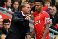 Liverpool manager Brendan Rodgers with Raheem Sterling