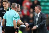 Celtic manager Brendan Rodgers shakes hands with referee William Collum