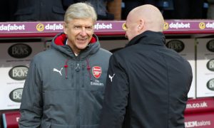 Arsenal manager Arsene Wenger (left) and Burnley manager Sean Dyche