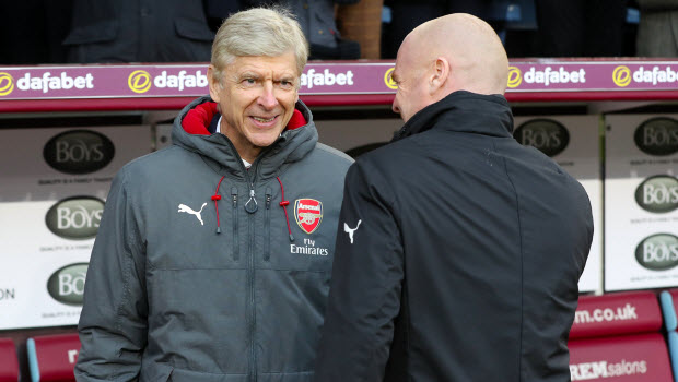 Arsenal manager Arsene Wenger (left) and Burnley manager Sean Dyche