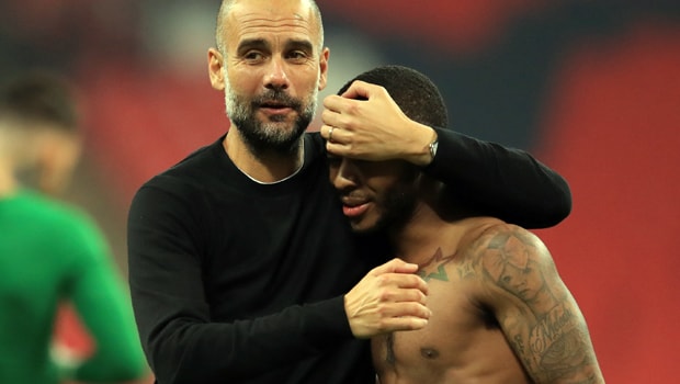 Pep-Guardiola-and-Raheem-Sterling-Man-City-min