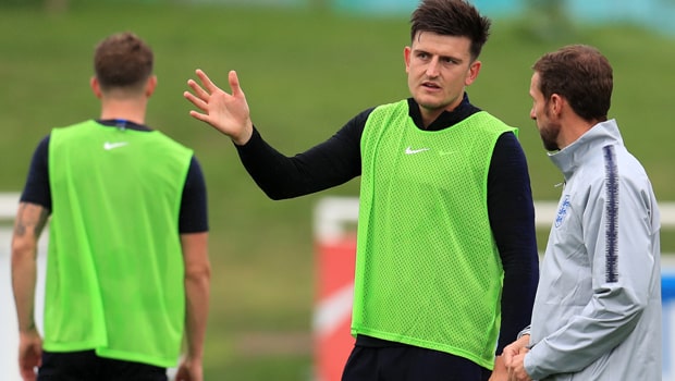 Harry-Maguire-and-Gareth-Southgate-England-min