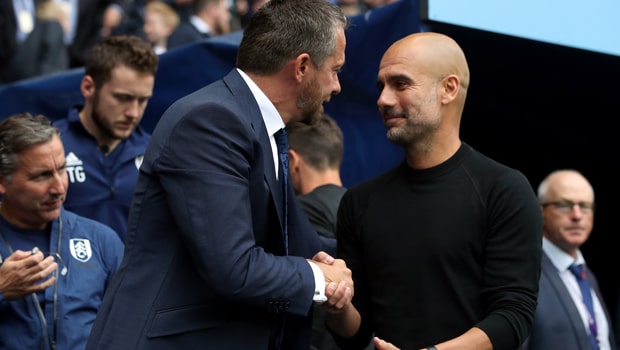 Pep-Guardiola-Manchester-City-coach-min