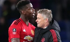 Ole-Gunnar-Solskjaer-and-Paul-Pogba-Man-United-min